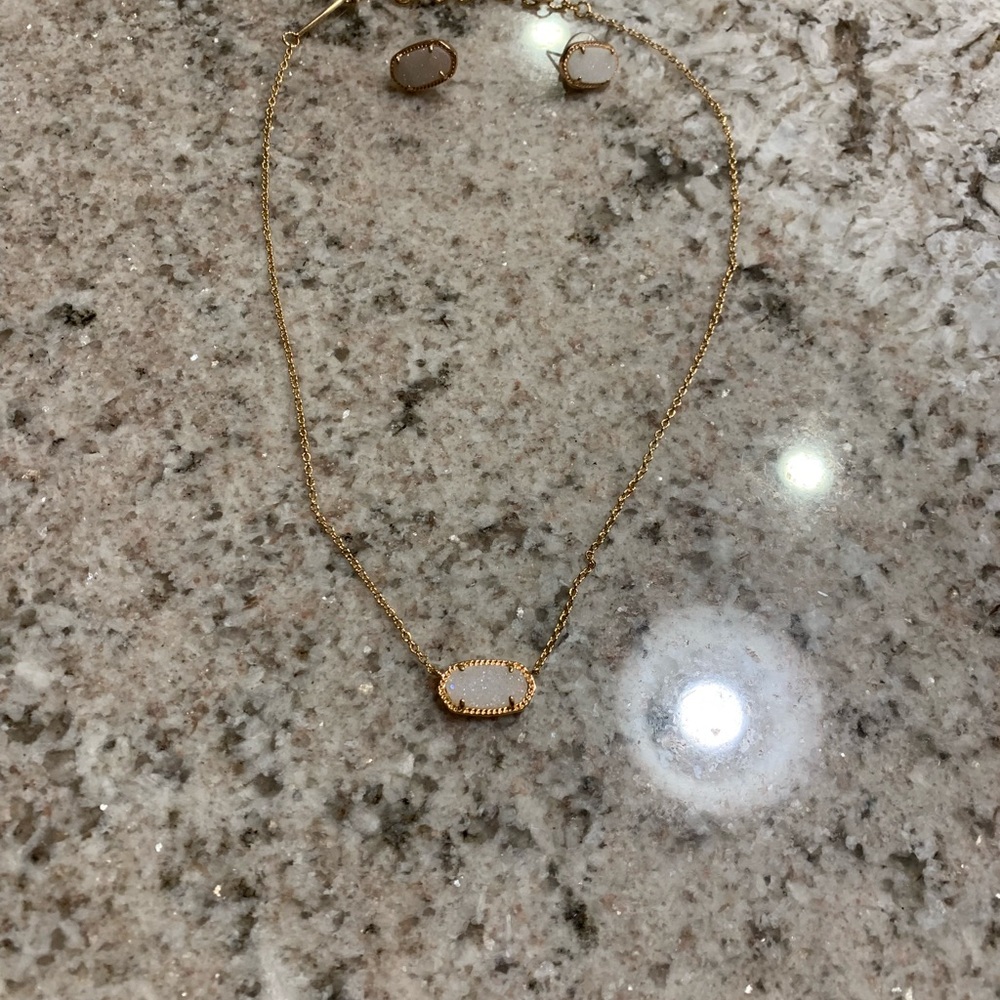 Kendra Scott necklace and earrings.